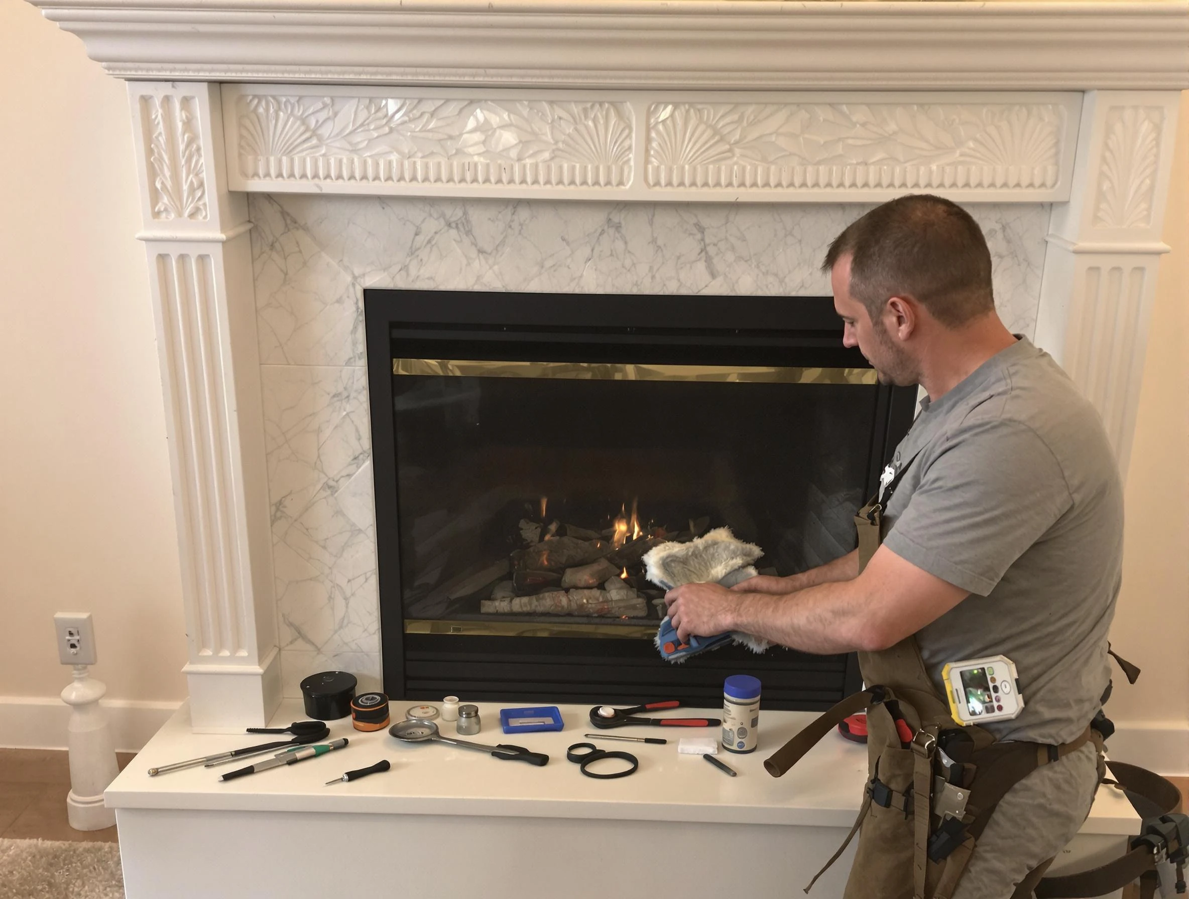 Roswell Chimney Sweep performing fireplace maintenance in Roswell, GA